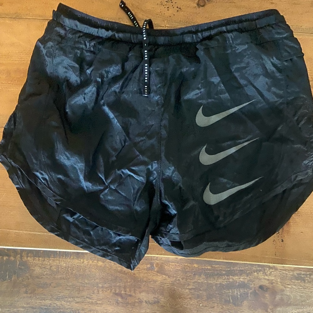 Two Pairs of Nike Running shorts